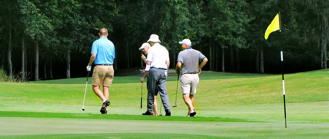 Four men walking on golf course in Port Wentworth Georgia