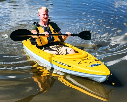 Man paddling kayak in Port Wentworth Georgia